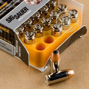 Image detailing the nickel-plated brass case and boxer primers on the SIG ammunition.