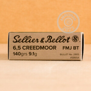 A photograph detailing the 6.5MM CREEDMOOR ammo with FMJ-BT bullets made by Sellier & Bellot.