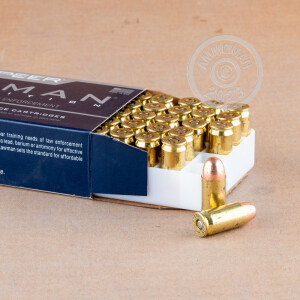 A photograph detailing the .45 Automatic ammo with TMJ bullets made by Speer.