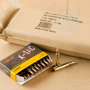 A photograph of 1000 rounds of 55 grain 5.56x45mm ammo with a FMJ-BT bullet for sale.