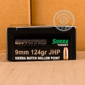 A photograph of 1000 rounds of 124 grain 9mm Luger ammo with a JHP bullet for sale.