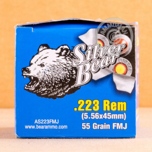 A photograph of 20 rounds of 55 grain 223 Remington ammo with a FMJ bullet for sale.