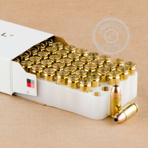 A photograph detailing the 9mm Luger ammo with JHP bullets made by Federal.