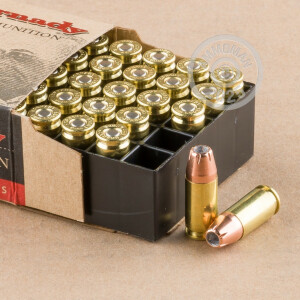 A photograph detailing the 9mm Luger ammo with XTP bullets made by Hornady.