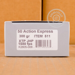 A photograph of 20 rounds of 300 grain 50 Action Express ammo with a XTP bullet for sale.