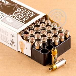 A photograph detailing the 9mm Luger ammo with JHP bullets made by Remington.