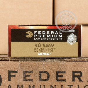 Photo detailing the 40 S&W FEDERAL PREMIUM LAW ENFORCEMENT 155 GRAIN HST HP (1000 ROUNDS) for sale at AmmoMan.com.