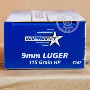 A photograph of 50 rounds of 115 grain 9mm Luger ammo with a JHP bullet for sale.