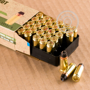 A photograph of 1000 rounds of 124 grain 9mm Luger ammo with a JHP bullet for sale.