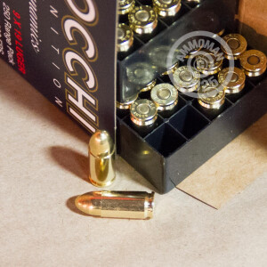 A photograph detailing the 9mm Luger ammo with FMJ bullets made by Fiocchi.