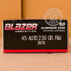 A photograph detailing the .45 Automatic ammo with FMJ bullets made by Blazer.