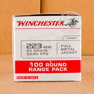 A photograph of 100 rounds of 55 grain 223 Remington ammo with a FMJ bullet for sale.