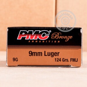 A photograph detailing the 9mm Luger ammo with FMJ bullets made by PMC.