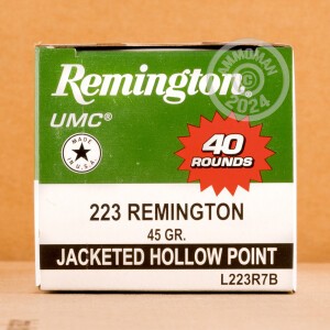 A photograph detailing the 223 Remington ammo with JHP bullets made by Remington.