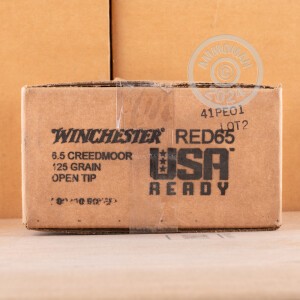 A photo of a box of Winchester ammo in 6.5MM CREEDMOOR.