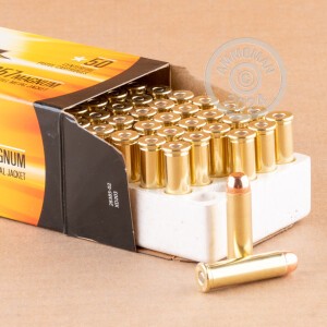 A photograph of 50 rounds of 158 grain 357 Magnum ammo with a FMJ bullet for sale.