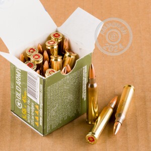 A photograph detailing the bulk 5.56x45mm ammo with FMJ bullets made by Old Army Ammunition.