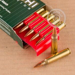 A photograph of 200 rounds of 77 grain 223 Remington ammo with a Hollow-Point Boat Tail (HP-BT) bullet for sale.