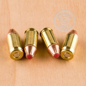 A photograph detailing the .380 Auto ammo with JHP bullets made by Hornady.