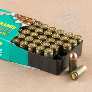 A photograph of 50 rounds of 94 grain 9x18 Makarov ammo with a FMJ bullet for sale.