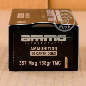 A photograph detailing the 357 Magnum ammo with Total Metal Jacket (TMJ) bullets made by Ammo Incorporated.