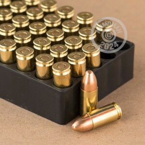 A photograph of 900 rounds of 115 grain 9mm Luger ammo with a FMJ bullet for sale.