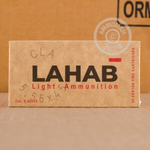 A photograph detailing the 5.56x45mm ammo with Full Metal Jacket (FMJ) bullets made by Lahab Ammunition.