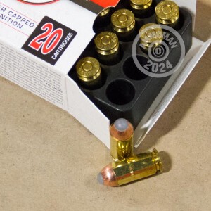 A photograph of 20 rounds of 135 grain .40 Smith & Wesson ammo with a JHP bullet for sale.