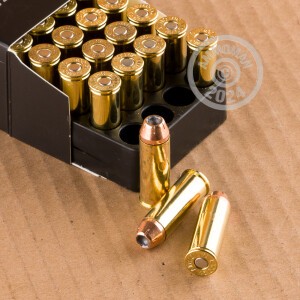 A photograph detailing the .45 COLT ammo with JHP bullets made by Ammo Incorporated.