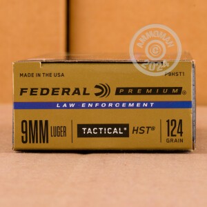 A photograph of 1000 rounds of 124 grain 9mm Luger ammo with a JHP bullet for sale.