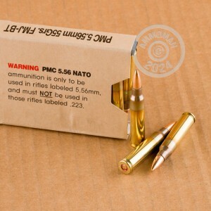 An image of bulk 5.56x45mm ammo made by PMC at AmmoMan.com.