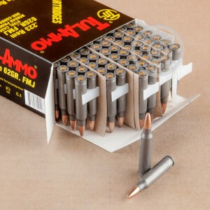 A photograph of 100 rounds of 62 grain 223 Remington ammo with a FMJ bullet for sale.