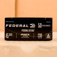 A photograph detailing the .45 Automatic ammo with JHP bullets made by Federal.