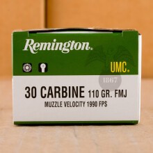 A photograph of 50 rounds of 110 grain .30 Carbine ammo with a FMJ bullet for sale.