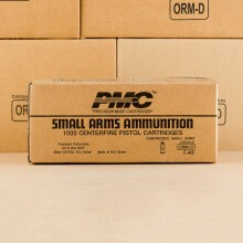 A photograph detailing the .380 Auto ammo with FMJ bullets made by PMC.