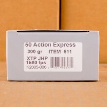 A photograph of 20 rounds of 300 grain 50 Action Express ammo with a XTP bullet for sale.