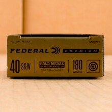 A photograph of 50 rounds of 180 grain .40 Smith & Wesson ammo with a TMJ bullet for sale.