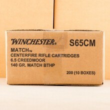 A photograph detailing the 6.5MM CREEDMOOR ammo with Hollow-Point Boat Tail (HP-BT) bullets made by Winchester.