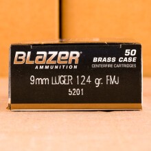 A photograph detailing the 9mm Luger ammo with FMJ bullets made by Blazer Brass.