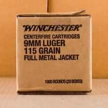 A photograph detailing the 9mm Luger ammo with FMJ bullets made by Winchester.